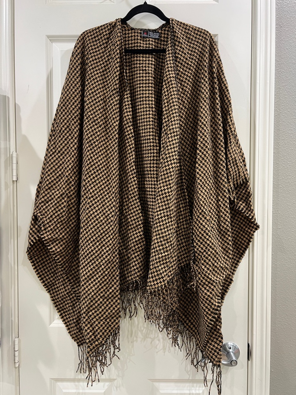Brown and black houndstooth cape